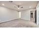 Spacious bedroom with neutral carpet, recessed lighting and access to other areas at 2878 Via Firenze, Henderson, NV 89044