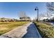 Community park in Henderson featuring lawns, trees, pathways and neighborhood amenities at 2878 Via Firenze, Henderson, NV 89044