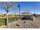 Solista Park in Henderson featuring a park sign, manicured lawns, and residential homes at 2878 Via Firenze, Henderson, NV 89044