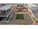 This spacious backyard showcases gravel, pavers, artificial turf, a custom pergola, and a low block wall at 3008 Soledad Dr, Laughlin, NV 89029
