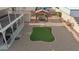 This home's backyard has gravel, pavers, a shed, turf, pergola with seating, and a two-story patio at 3008 Soledad Dr, Laughlin, NV 89029