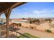 Backyard view with a gazebo, gravel landscaping, and a distant mountain view at 3008 Soledad Dr, Laughlin, NV 89029