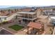 A scenic backyard featuring an upper patio, gazebo, shed, and charming landscaping at 3008 Soledad Dr, Laughlin, NV 89029