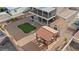 Spacious backyard featuring a gazebo, storage shed, and artificial turf area at 3008 Soledad Dr, Laughlin, NV 89029