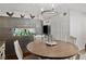 Dining area with a wood table and chairs next to a built in aquarium and storage at 3008 Soledad Dr, Laughlin, NV 89029