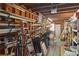 Garage featuring exposed studs and rafters, filled with disorganized storage at 3008 Soledad Dr, Laughlin, NV 89029