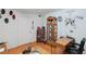 View of an office space showcasing a display case and a desk with sports team decor at 3008 Soledad Dr, Laughlin, NV 89029