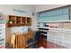 Cozy office features sewing space with storage, wooden shelves, and blue storage boxes at 3008 Soledad Dr, Laughlin, NV 89029