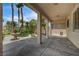 Lush backyard patio with mature landscaping and a water feature, perfect for outdoor relaxation at 301 Lakewood Garden Dr, Las Vegas, NV 89148
