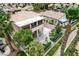 Aerial backyard view featuring a water fountain, beautiful landscaping, and a balcony at 301 Lakewood Garden Dr, Las Vegas, NV 89148