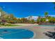 Multiple outdoor basketball courts with volleyball courts and lush landscaping at 301 Lakewood Garden Dr, Las Vegas, NV 89148