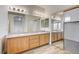 Spacious main bathroom with a double sink vanity and large mirrors at 301 Lakewood Garden Dr, Las Vegas, NV 89148