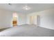 Main bedroom featuring plush carpeting and access to the attached bathroom at 301 Lakewood Garden Dr, Las Vegas, NV 89148