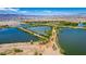 Aerial view showcases serene community lakes under a blue sky at 330 Spring Dove Ave, Henderson, NV 89011