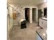 En-suite bathroom featuring double sinks, granite countertops, and a glass-enclosed shower at 330 Spring Dove Ave, Henderson, NV 89011