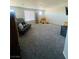 Spacious bedroom with carpet flooring, a large window, and ample natural light, creating a cozy atmosphere at 330 Spring Dove Ave, Henderson, NV 89011