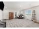 Spacious bonus room with plush carpet and natural light from the window at 330 Spring Dove Ave, Henderson, NV 89011