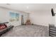 Cozy bonus room featuring plush carpet, a window view, and a comfy seating area at 330 Spring Dove Ave, Henderson, NV 89011
