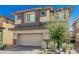 Lovely two-story home with a two car garage, set amidst a manicured yard at 330 Spring Dove Ave, Henderson, NV 89011
