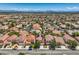 Wide aerial shot captures the neighborhood layout, showcasing consistent architectural style and a community setting at 3412 Crystal Tower St, Las Vegas, NV 89129