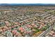 Expansive aerial view showcases the community's well-planned layout, lush landscaping, and uniform home styles at 3412 Crystal Tower St, Las Vegas, NV 89129