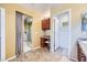Spacious bathroom with tile floors, walk-in closet, vanity area and granite countertop at 3412 Crystal Tower St, Las Vegas, NV 89129
