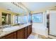 Bathroom area featuring a large vanity and dual sinks at 3412 Crystal Tower St, Las Vegas, NV 89129