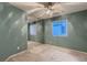 This bedroom features a ceiling fan, neutral walls, and a large sliding closet door at 3412 Crystal Tower St, Las Vegas, NV 89129