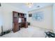 Study bedroom featuring a wooden desk with upper shelves and a window at 3412 Crystal Tower St, Las Vegas, NV 89129