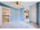 Spacious bedroom featuring a mirrored closet and neutral carpeting at 3412 Crystal Tower St, Las Vegas, NV 89129