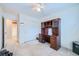 Bedroom featuring desk with built in shelving, ceiling fan and access to closet at 3412 Crystal Tower St, Las Vegas, NV 89129
