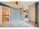 Bedroom featuring neutral carpet and ample closet space at 3412 Crystal Tower St, Las Vegas, NV 89129