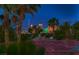 Stunning city view at dusk, framed by palm trees and rooftops at 3412 Crystal Tower St, Las Vegas, NV 89129