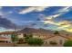Scenic view of the community showcasing neighborhood houses and mountain landscape at sunset at 3412 Crystal Tower St, Las Vegas, NV 89129