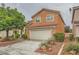 Attractive home exterior with a two-car garage and tasteful landscaping, offering curb appeal at 3412 Crystal Tower St, Las Vegas, NV 89129