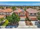 A beautiful two-story home showcasing its tile roof, well-maintained yard, and proximity to mountain views at 3412 Crystal Tower St, Las Vegas, NV 89129