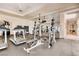 Well-equipped gym features weight machines, treadmills, and mirrored walls for a complete workout experience at 3412 Crystal Tower St, Las Vegas, NV 89129