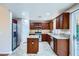Bright kitchen with granite counters, stainless steel appliances, and a center island at 3412 Crystal Tower St, Las Vegas, NV 89129
