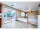 Bright kitchen with granite counters, stainless steel appliances, and backyard access at 3412 Crystal Tower St, Las Vegas, NV 89129
