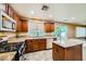 Beautiful kitchen featuring granite countertops, island, and modern appliances at 3412 Crystal Tower St, Las Vegas, NV 89129