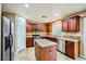 Well-equipped kitchen with stainless steel appliances and a granite island at 3412 Crystal Tower St, Las Vegas, NV 89129