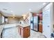 Bright eat-in kitchen featuring tile floors, stainless steel appliances, and granite countertops at 3412 Crystal Tower St, Las Vegas, NV 89129