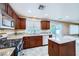 Bright kitchen with granite counters, stainless steel appliances, and a gas cooktop at 3412 Crystal Tower St, Las Vegas, NV 89129