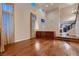 Open-concept living room with gleaming hardwood floors and a built-in cabinet at 3412 Crystal Tower St, Las Vegas, NV 89129