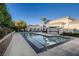 Resort-style community pool with a dedicated shallow area and adjacent clubhouse at 3412 Crystal Tower St, Las Vegas, NV 89129