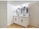 Elegant bathroom with double vanity, sleek fixtures, and modern lighting at 3459 One Nation Ave, Las Vegas, NV 89121