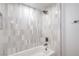 Bathroom features modern fixtures, stylish tiled shower and bathtub at 3459 One Nation Ave, Las Vegas, NV 89121