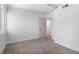 Bright bedroom featuring neutral carpet, a window, and closet at 3459 One Nation Ave, Las Vegas, NV 89121