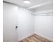 Walk-in closet featuring painted walls, baseboards, recessed lighting, and a closet rod at 3459 One Nation Ave, Las Vegas, NV 89121