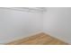 White closet space with wooden floor, great for storage and organization at 3459 One Nation Ave, Las Vegas, NV 89121